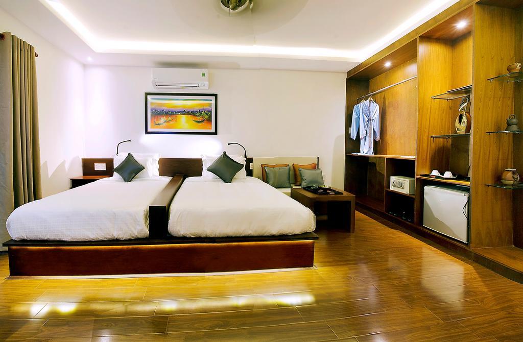 Azumi Hotell Hoi An Rum bild